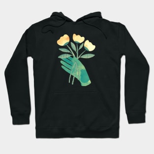 Green hand with yellow flowers for you on black background Hoodie